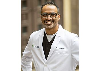 Photo of NIRAV PATEL, CONDITIONS TREATED:Gum Disease and TMJ Disorder
TREATMENTS OFFERED:Braces, Bonding, Crowns, Gum Contouring/Grafting, Invisalign, Veneers, Snap-on Smile, Teeth Whitening, Tooth-Colored Filling, Cleanings, Bridges, Fillings, Examinations, Root Canal Therapy, Tooth Extraction &amp; Bone Grafting in IRVING