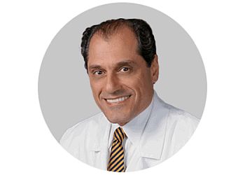 Photo of OMAR E. HANUCH, CONDITIONS TREATED:Cataract, Glaucoma, Macular Degeneration, Diabetic Retinopathy, Corneal Diseases, Dry Eye/Tearing, Floaters &amp; Refractive Errors in ROCHESTER