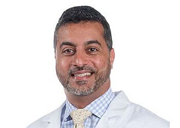 Photo of ONER A. KHERA, CONDITIONS TREATED: Fractures, Spinal Stenosis, Spinal Tumors, Spinal Infections, Scoliosis, Coccygeal Pain, Degenerative Disc Disease, Gait Abnormality, Herniated Disc, Joint Pain, Kyphosis, Limb Pain, Metastatic Cancer of the Spine, Myelopathy, Osteomyelitis, Pinched Nerve, Spine Deformities &amp; Systemic Sclerosis
TREATMENTS OFFERED: Anterior Lumbar Interbody Fusion, Herniated Disc Surgery, Laminoforaminotomy, Lumbar Hemilaminotomy, Lumbar Laminectomy, Posterior Cervical Laminectomy, Spinal Cord Stimulation, Thoracic Laminectomy &amp; Transforaminal Lumbar Interbody Fusion in SHREVEPORT