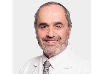 Photo of ORLANDO J. SURIS, CONDITIONS TREATED: Polycystic Ovarian Syndrome, Menopause, Osteoporosis &amp; Menstrual DisordersTREATMENTS OFFERED: Annual Well-Woman Care, Birth Control, Sexually Transmitted Disease Testing and Education, Pap Smears, Evaluation and Treatment of Menstrual Disorders, Osteoporosis and Bone Density Screening and Treatment, Cancer Screening, Minimally Invasive Surgery, Including Laparoscopically Assisted Hysterectomy, Gynecologic Surgery in SAN ANTONIO