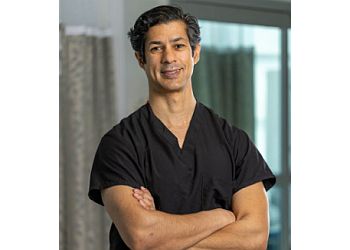 Photo of P. RONJAN PAUL, CONDITIONS TREATED: Acute Neck Pain, Cervical Radiculopathy, Cervical Myelopathy, Lumbar Herniated Disc, Lumbar Spinal Stenosis, Spondylolisthesis, Lumbar Degenerative Disc Disease, Acute Low Back Pain, Chronic Low Back Pain, SI Joint Pain, Muscle Spasms, Osteoarthritis, Athletic Rehabilitation, Physical Therapy, Epidural Steroid Injections, Lumbar Zygapophysial Joint Injections, Activity Modification &amp; Ergonomic Changes
TREATMENTS OFFERED:Anterior Cervical Fusion, Anterior Cervical Disc Replacement, Anterior Lumbar Fusion, Lateral Interbody Fusion, Lumbar Decompression, Lumbar Microdiscectomy &amp; Minimally Invasive TLIF in NAPERVILLE