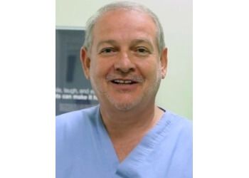 Photo of PATRICK E. RYAN, TREATMENTS OFFERED:General Dentistry, Dental Exams and Cleanings, Braces, Dental Restorations, Implants, Invisalign, Teeth Whitening, Veneers, Orthodontics, Crowns, X-Rays, Dentures, Endodontics &amp; Root Canal Treatment in PATERSON