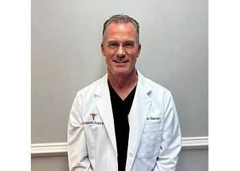 Photo of PHILIP P. GARRETT, CONDITIONS TREATED:Wound Care, Bunions, Nail Care, Plantar Fasciitis, Fractures, Custom Orthotics, Hammertoes, Heel and Foot Pain, Sports Medicine, Plantar Warts, Tendonitis &amp; Neuropath in ALEXANDRIA