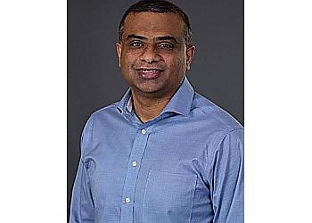 Photo of PRAVEEN MANDERA, TREATMENTS OFFERED:Pediatric, Family, Cosmetic and Restorative Dentistry, Bonding, Veneers, Digital X-Rays, Intraoral Camera, Teeth Whitening, Dental Implants, Root Canal, Emergency Care, Tooth Extraction, Laser &amp; Crowns in MANCHESTER