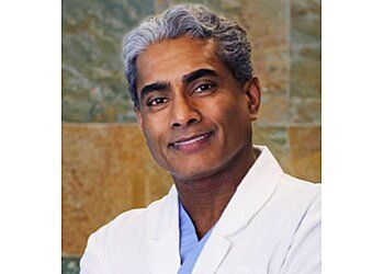 Photo of RAJNIK RAAB, CONDITIONS TREATED:Herniated Discs of The Spine, Scoliosis, Spinal Stenosis, Spine Tumors, Brain Tumors, Stereotactic Biopsy, Endoscopic Brain Surgery, Pituitary Tumors, Meningiomas, Glioblastomas, Astrocytomas, Minimally Invasive Spine Surgery, Discectomy, Laminectomy, Cervical Disc Replacement and Spinal FusionTREATMENTS OFFERED:Acoustic Neuroma Surgery, Brain Surgery for Hemangioblastoma, Brain Tumor Surgery, Craniotomy, Endoscopic Brain Surgery, Endoscopic Craniopharyngioma Surgery, Meningioma of the Brain Surgery, Metastatic Brain Tumor Surgery, Pituitary Tumor Surgery, Brain Treatments, Endoscopic Transsphenoidal Surgery, Gamma Knife Treatment, Linear Accelerator, Proton Therapy &amp; Radiation Therapy in JERSEY CITY