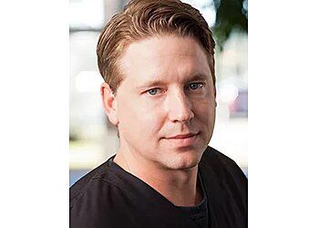 Photo of RYAN SHOCK, CONDITIONS TREATED:Bunion, Achilles Tendonitis, Diabetic Neuropathy, Flat Feet, Toenail Fungus, Gout, Lapiplasty, Haglund&#x27;s Deformity, Hammertoes, Heel Pain, Ingrown Toenails, Neuroma, Plantar Fasciitis, and Warts, Tarsal Tunnel Syndrome, Diabetic Foot Care, Sports Injuries, Reconstructive Foot and Ankle Surgery, Athlete&#x27;s Foot &amp; Ankle Arthroscopy in AUSTIN