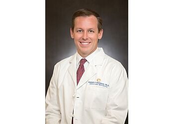 Photo of SAMUEL P. ROBINSON, CONDITIONS TREATED: Patellar and Quadriceps Tendon Disorders, Athletic Injuries &amp; Trauma
TREATMENTS OFFERED: Anatomic and Reverse Total Shoulder Replacements, Total and Partial Knee Replacement, Revision Shoulder and Knee Arthroplasty, Patellar Instability, Knee and Shoulder Arthroscopic Surgery, Articular Cartilage Restoration, Rotator Cuff &amp; Ligament Repair in VIRGINIA BEACH