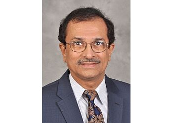 Photo of SATISH KRISHNAMURTHY, CONDITIONS TREATED:Brain and Spine Tumors, Brain Injury, Brain Tumor, Hydrocephalus, Spinal Cord Injury, Peripheral Nerve, Carpal Tunnel, Cervical, Thoracic, and Lumbar Degenerative Deformity for Adults, Cervical Arthritic DiscTREATMENTS OFFERED:Minimally Invasive Surgery, Neurocritical Care, Neurological Surgery,
Pediatric Neurosurgery, Brain &amp; Spine Tumors Surgeries in SYRACUSE