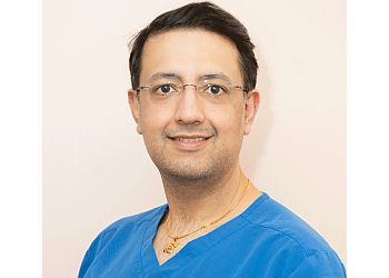 Photo of SEHGAL, CONDITIONS TREATED:Oral Hygiene, Children’s Dentistry, Arestin and Periodontal Maintenance TREATMENTS OFFERED:Dental Filling, Amalgam Fillings, Root Canal Treatment, Dental Sealants, Immediate Dentures, Dentures, Implant Retained Dentures, Snap-In Dentures, Partial Dentures, Denture Care, Exams &amp; Maintenance, Denture Relines, Rebase &amp; Repairs, Soft Liners, Dental Bridges, Dental Implants, Dental Crowns, Bone Grafting Socket Preservation, Tooth Extractions, Gum Disease Laser Therapy, Teeth Whitening, Dental Bonding, Porcelain Veneers, Invisalign, Inlays &amp; Onlays in SPRINGFIELD