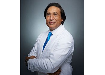 Photo of SHAHID RASHID, CONDITIONS TREATED: Migraine, Headaches, Back Pain, Neck Pain, Shoulder Pain, Phantom Limb Pain, Joint Pain, Pelvic Pain, Knee Pain, Foot Pain, Complex Regional Pain Syndrome, Peripheral Neuropathies, Work Injuries, Personal Injuries, Auto Injuries, Sciatica, Herniated (Bulging) Disc, Fibromyalgia, Trigeminal Neuralgia Compression Fractures, Spinal Stenosis and Failed Back Syndrome TREATMENTS OFFERED: Interventional Pain Management Techniques &amp; Therapies to Control Pain in BROWNSVILLE