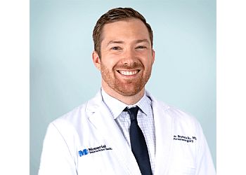 Photo of SIMON BUTTRICK, CONDITIONS TREATED:Herniated Disks, Hydrocephalus, Lumbar Spinal Stenosis, Meningomyelocele, Parkinson&#x27;s Disease, Peripheral Nerve Injury, Pituitary Tumors, Spinal Cord Injuries, Stroke or Brain Attack, Trigeminal Neuralgia, Brain Tumors, Acoustic Neuromas, Brain Aneurysm/AVM, Carotid Artery Disease, Carpal Tunnel Syndrome, Cervical Spine Disorders, Chronic Pain &amp; Degenerative Lumbar Spinal Disease in PEMBROKE PINES