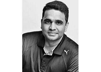 Photo of SREEJITH KURUP, CONDITIONS TREATED:
Tennis Elbow and Achilles Tendonitis), Rheumatoid Arthritis, Osteoarthritis, Trigger Points, Thoracic Pain, Neck Pain, Jaw Soreness, Plantar Fasciitis, Jumper’s Knee, Hamstring Tendonitis, Lower Back Pain, Frozen Shoulder (Adhesive Capsulitis), Calcific Tendonitis, Tennis Elbow (Lateral Epicondylitis), Shin Splints (Medial Tibial Stress Syndrome), Stress Fractures, Calf Muscle Shortening, Periarticular Shoulder Pain, Soft Tissue Conditions, Metatarsalgia &amp; Hip Bursitis
TREATMENTS OFFERED:
Shockwave Therapy, Physiotherapy, Laser Therapy Acupuncture, Chiropractic, Compression Stockings, Athletic Therapy, Psychotherapy, Sports Rehab &amp; Massage Therapy in NEWMARKET