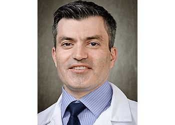 Photo of SULEMAN BANGASH, CONDITIONS TREATED:Acne, Mole Check and Removal, Psoriasis, Rash, Eczema, Rosacea, Skin Cancer, Skin Tag Removal, Vitiligo, Warts, Acne Myths, Acne Skin Care, Acne Treatment, Actinic Keratoses, Athletes Foot, Atopic Dermatitis, Blistering Diseases, Cysts and Warts, Dry Skin Tips, Folliculitis, Fungal Nail Infection (Onychomycosis), Fungal Skin Infections (Tinea, Ringworm), Hair Loss (Balding), Hand Dermatitis, Herpes (Oral or Skin), Hives, Impetigo, Keratosis Pilaris, Lentigines, Lichen Planus, Melasma, Moles (Dysplastic), Moles (Nevi) &amp; Nail Health and Nail DiseasesTREATMENTS OFFERED:Microneedling, Brown Spots/Skin Aging, Chemical Peels, Lasers, Botox &amp; Fillers in ELGIN