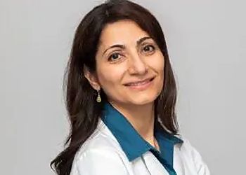 Photo of TASNEEM LAKHA, CONDITIONS TREATED: Periodontal Disease TREATMENTS OFFERED: Crown Lengthening, Veneers, Root Canal Treatment, Exams, Cleaning, Oral Cancer Screening, Fluoride Treatment, Bonding, Air Abrasion, Composite Fillings, Porcelain Fixed Bridges, Tooth Whitening, Sealants, Inlays, Onlays, Dentures, Partial Dentures &amp; Extractions in AURORA