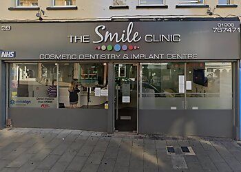 Photo of THE SMILE CLINIC, TREATMENTS OFFERED:
Routine Dentistry, Root Canals, White Fillings, Same Day Crowns, Enlighten Teeth Whitening, Porcelain Veneers, Invisalign, Clear Aligners, Smile Makeovers, Damon Orthodontics, Dental Implants, Six Month Smiles, Facial Aesthetics, Laser Hair Removal &amp; Invisible Braces in COLCHESTER