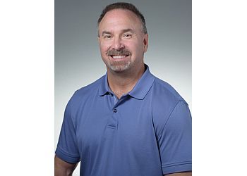 Photo of THOMAS F. PLUNKETT, CONDITIONS TREATED: Preventive Dentistry, Dentistry for Kids, Periodontal Care and Oral Cancer  TREATMENTS OFFERED: Dental Cleaning and Exam, Scaling, Root Planing, Sports guard, Teeth Whitening, Emergency Services, Porcelain Crown, Filling, Crowns, Bridge, Implant &amp; Root Canal in LAKELAND