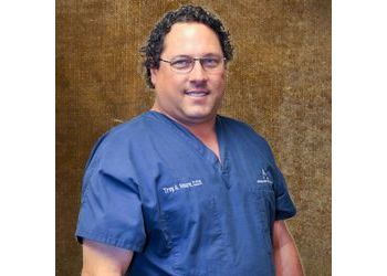 Photo of TROY A. MOORE, CONDITIONS TREATED: Missing Teeth and Periodontal TREATMENTS OFFERED: Dental Fillings, Cleaning, Sealants, Porcelain Veneers, Bonding, Implants, Extractions, Teeth Whitening, Bridges, Crowns, Dentures, Orthodontics, Nitrous Oxide Sedation, Braces, Non-Surgical Root Canal, Invisalign, Clear Braces &amp; Cosmetic Dentistry in AMARILLO