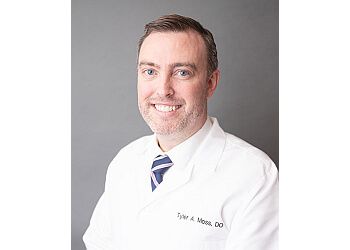 Photo of TYLER MOSS DO, CONDITIONS TREATED:Skin Cancer, Melanoma Removal, Squamous Cell Carcinoma, Skin Cancer Diagnosis, Basal Cell Skin Cancer, Actinic Keratosest, Skin Health, Acne, Mole Removal and Examinations, Wart Removal, Dermatitis, Eczema, Psoriasis, Molluscum, Rash Diagnosis, Fungus, Seborrheic Keratoses Treatment and Removal, Shingles Treatment and Post-Herpetic Neuralgia Relief, Sun Protection, Excessive Sweating &amp; RosaceaTREATMENTS OFFERED:Laser Treatments, Sclerotherapy and Vein Treatment, Chemical Peels, Botox + Dysport + Daxxify, Fillers &amp; SkinPen / Micro-needling in SURPRISE