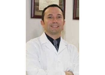 Photo of VICTOR J. DONGO, CONDITIONS TREATED:Gum Reconstruction, Crowns, Fixed Bridges, Veneers, Onlays, Teeth Whitening, Exams, Cleanings, X-Rays, Prevent Cavities, Implant, Composite Filling, Root Canal Therapy, Dentures, Partial Dentures, Sleep Apnea, Wisdom Teeth Removals, All-On-4 Dental Implants, Bone Grafting, Teeth Grinding, Extractions, Gum Disease, Lumineers &amp; TMJ Treatment in HIALEAH