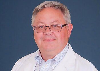 Photo of WILLIAM F. MCGUIRT, CONDITIONS TREATED:
Ear: Dizziness and Vertigo, Facial Numbness and Weakness, A Tingling Sensation in The Face, Changes in Taste, Hoarseness, Difficulty Swallowing, Headaches and Confusion, Loss of Balance, Trouble Sleeping, Hearing Loss, Chronic Infections, Meningitis, Ear Trauma, Earwax Buildup &amp; Tinnitus 
Nose: Thyroid Problems, Sinusitis, Loss of Smell, Chronic Cough, Crooked Nose, Bloody Nose &amp; Nosebleeds 
Throat: Regurgitation, Indigestion, Difficulty Swallowing, Hoarseness, Laryngitis, Tonsillitis &amp; Sore Throat in WINSTON SALEM