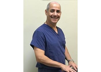 Photo of WILLIAM SALCEDO, CONDITIONS TREATED:Foot Surgery, Hammertoe, Haglund&#x27;s Deformity, Ganglions, Fungal Nail, Hallux Rigidus, Gout, Flat Feet, Children&#x27;s and Diabetic Foot Care, Bunions Treatments, Achilles Tendonitis, Heel Pain, Metatarsalgia, Morton&#x27;s Neuroma, Plantar Fasciitis, Osteoarthritis, Posterior Tibial Dysfunction &amp; Sesamoiditis Treatments in PORT ST LUCIE