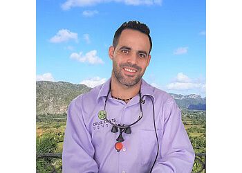 Photo of YULIEN CRUZ-DAVIS, CONDITIONS TREATED: Periodontal Disease (The Gums) and Tmj TREATMENTS OFFERED: Routine Cleanings, Mercury-Free Tooth-Colored Fillings, Smile Makeover, Root Canals, Pediatric Dental Care, Emergency Care, Extractions, Restorations, Orthodontics, Invisalign, Clear Braces, Laser Dentistry, Bridges, Dentures, Crowns, Veneers, Implants &amp; Botox in GAINESVILLE