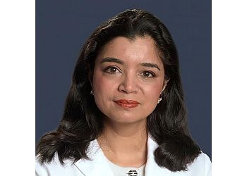 Photo of ZEENA DORAI, TREATMENTS OFFERED: Artificial Disc Replacement Surgery In The Cervical Spine, Artificial Disc Replacement Surgery In The Lumbar Spine, Back Surgery, Biological Enhancement Of Spine Fusions, Biopsy Of Brain, Brain Surgery, Burr Hole, Cerebral Decompression, Cervical Decompression, Cervical Laminoplasty, Cervical Laminotomy, Cervical Spine Fusion, Cervical Spine Revision, Cervical Spine Surgery, Chiari Decompression, Complex Spine Surgery, Craniectomy, Craniotomy, Csf Shunt Removal, Decompression Laminectomy, Decompression Median Nerve At Elbow, Disc Arthroplasty, Disc Replacement, Disc Surgery, Diskectomy, Gamma Knife Radiosurgery, Instrumented Anterior Cervical Discectomy, Fusion (ACDF), Laminectomy, Laminoplasty &amp; Low Back Surgery in BALTIMORE