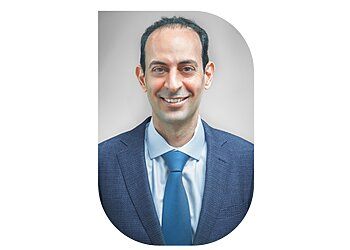 Photo of ZIAD JALBOUT, CONDITIONS TREATED: General Dental Exam and Cleaning TREATMENTS OFFERED: Crowns, Veneers, Tooth Bonding, Contouring, Invisalign, Ceramic Braces, At-Home Aligners, Implants, Bridges, Teeth Whitening, Aligners &amp; Retainers in NEW YORK CITY